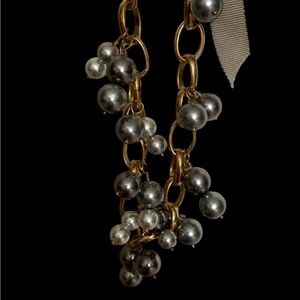 Blue/gray ball and gold chai with ribbon tie necklace